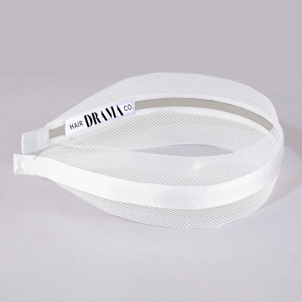 White visor with 'Hair Drama Co.' branding on a gray background