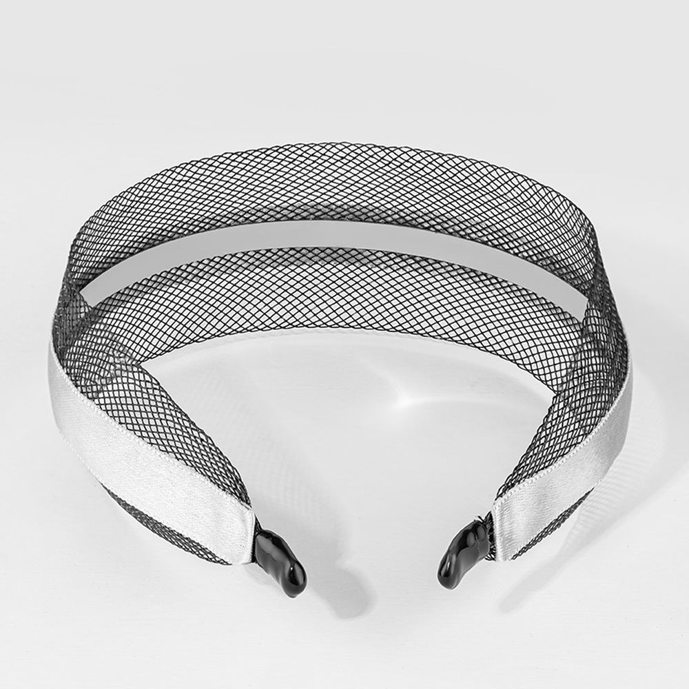 White visor with black mesh design on a light gray background